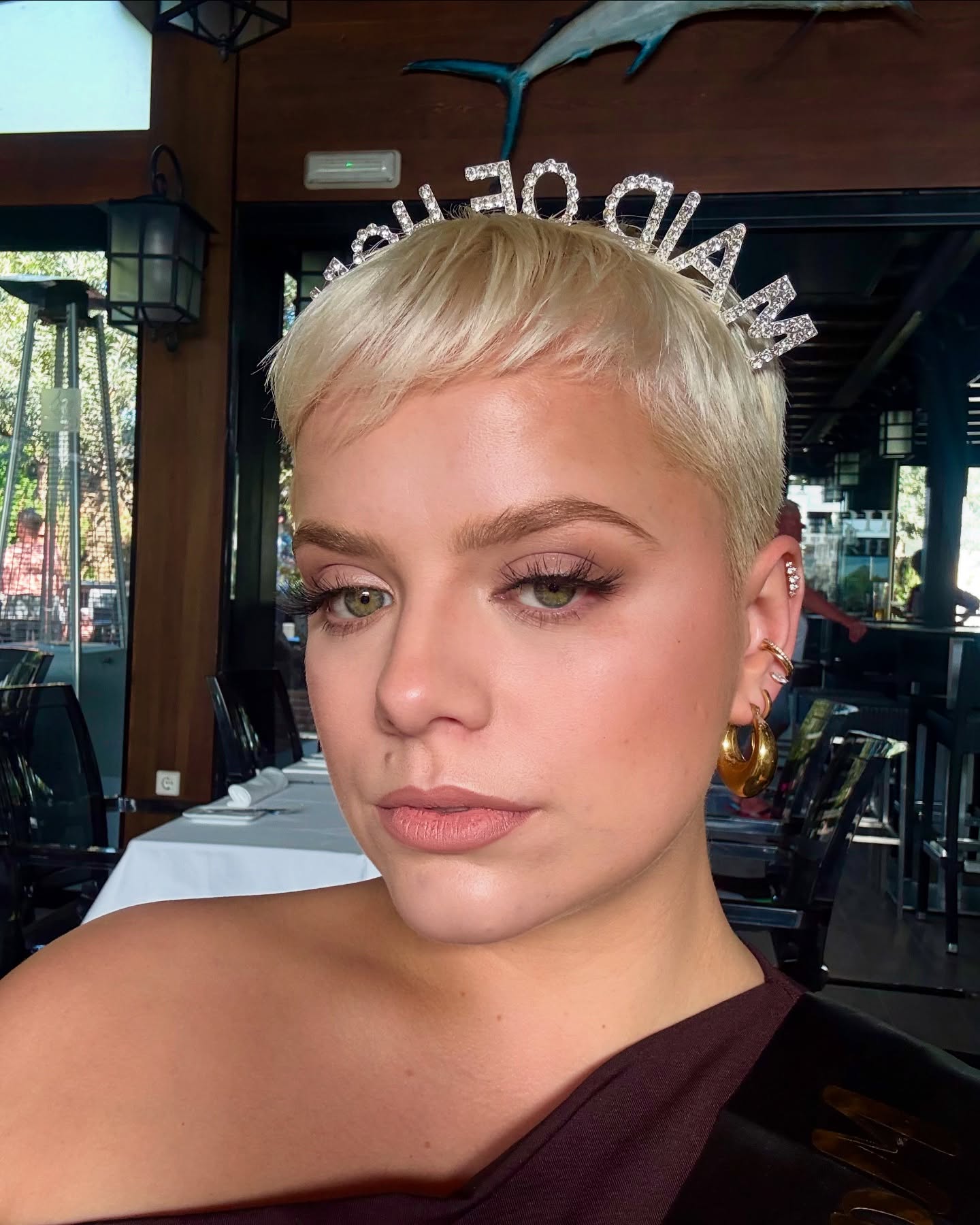 Chic Textured Platinum Pixie with Side-Swept Bangs