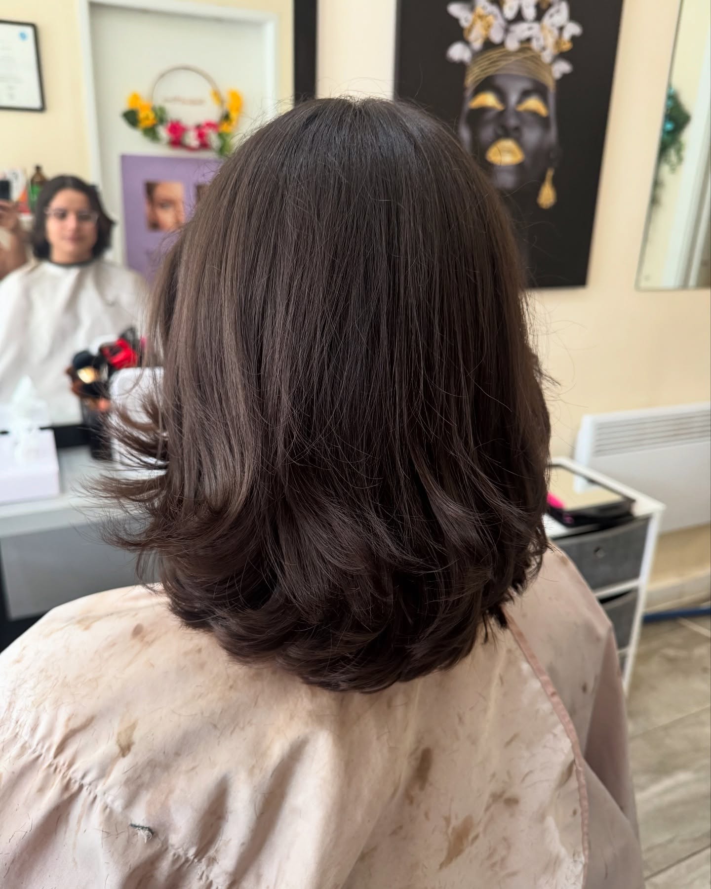 Elegant Softly Layered Mid-Length Haircut