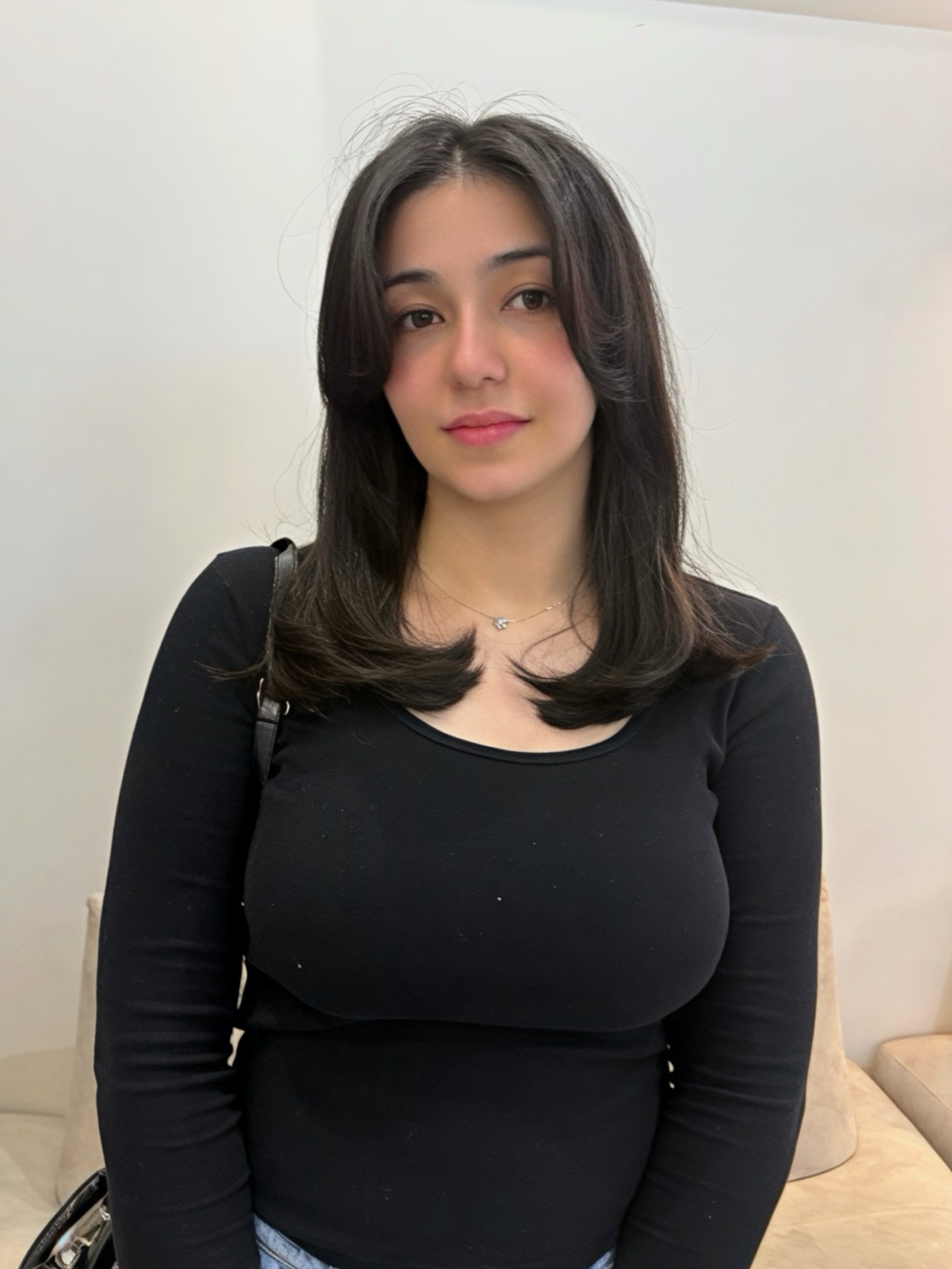 Layered Mid-Length Cut with Soft Face Framing