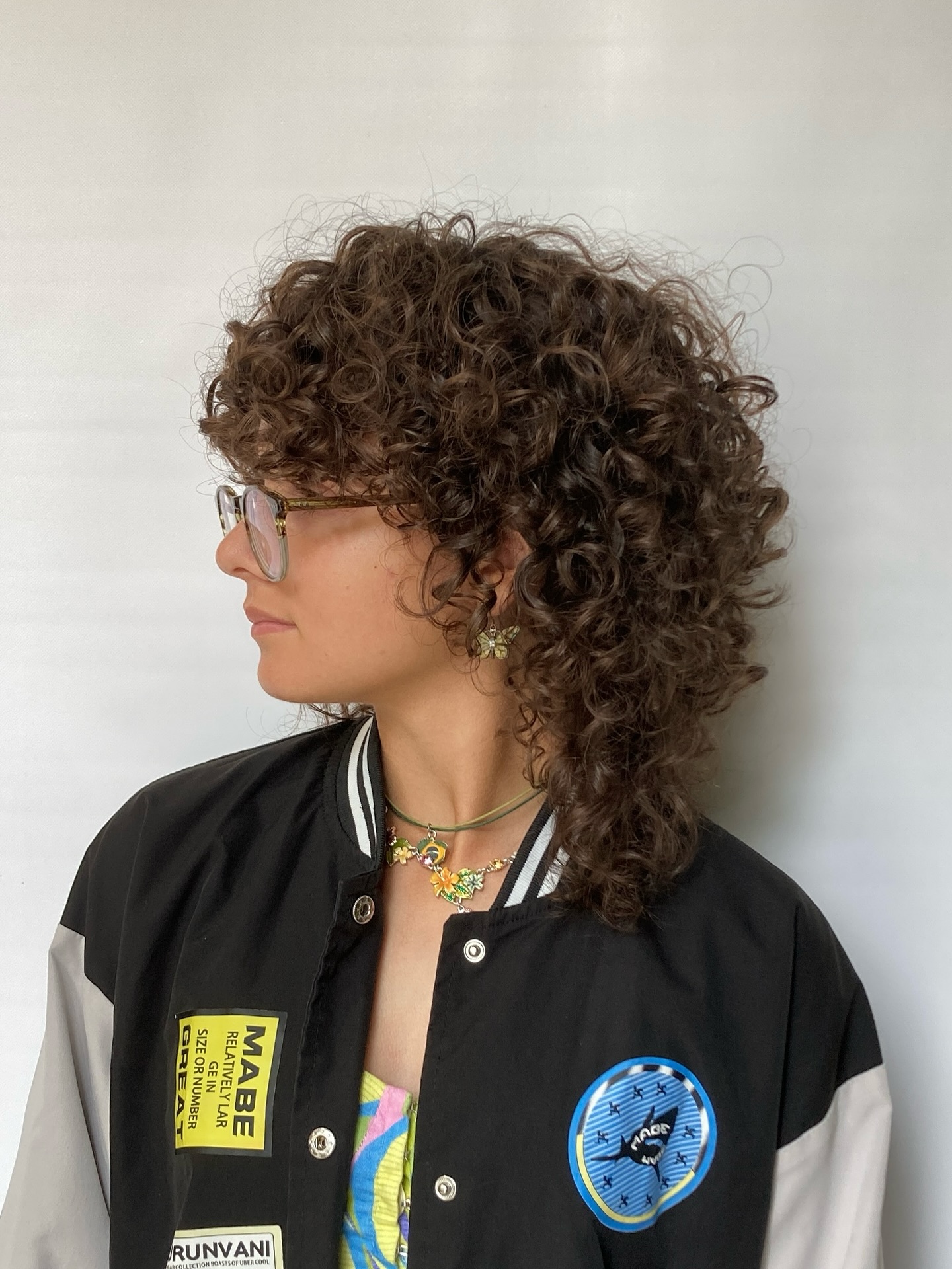 Playful Curly Shoulder-Length Cut with Soft Layers
