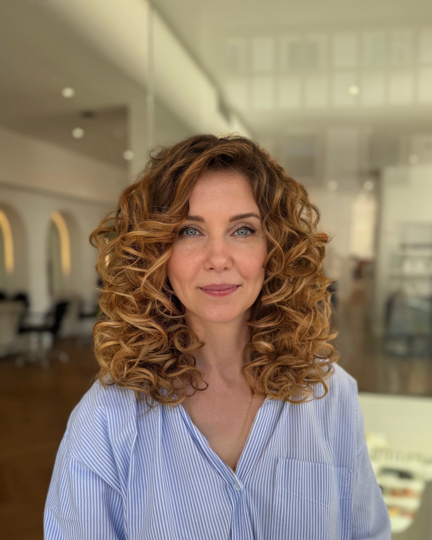 Soft Curly Shoulder-Length Layers