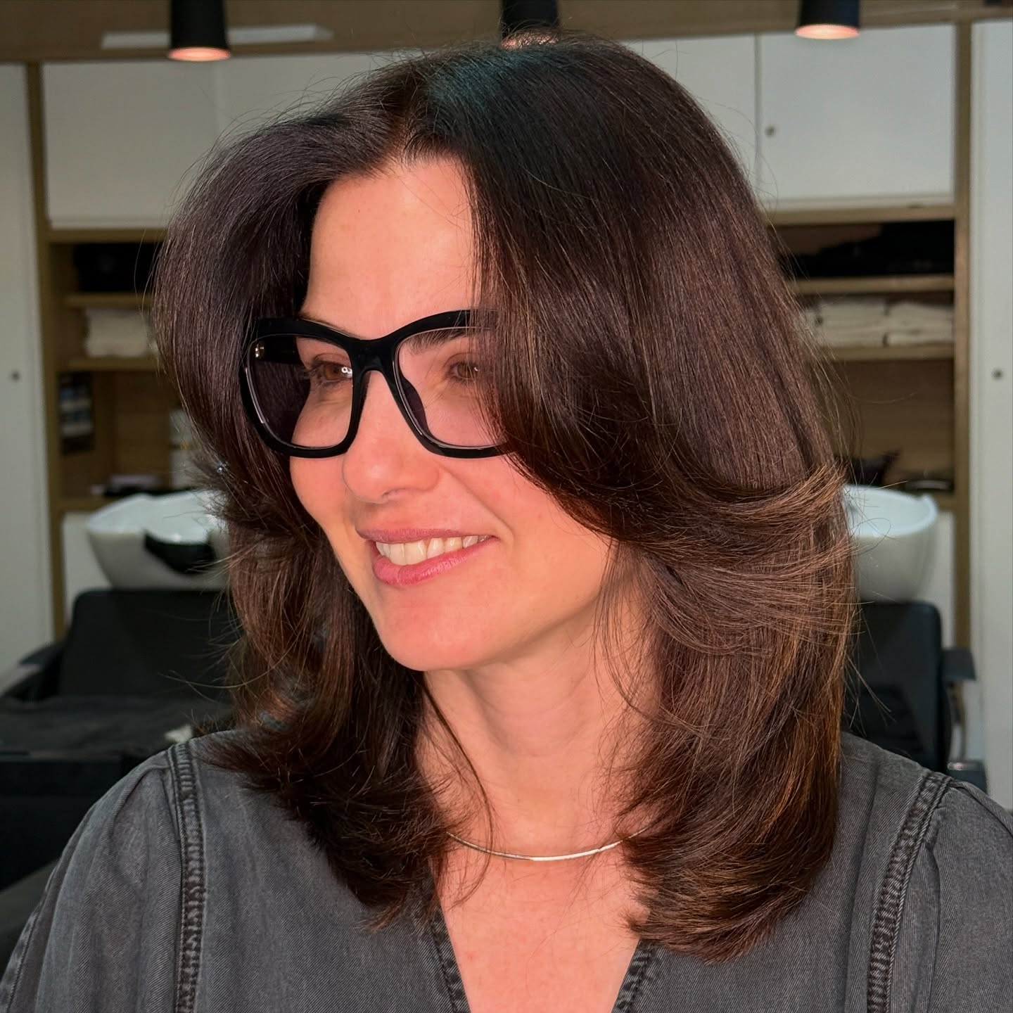 Softly Layered Mid-Length Cut with Gentle Movement