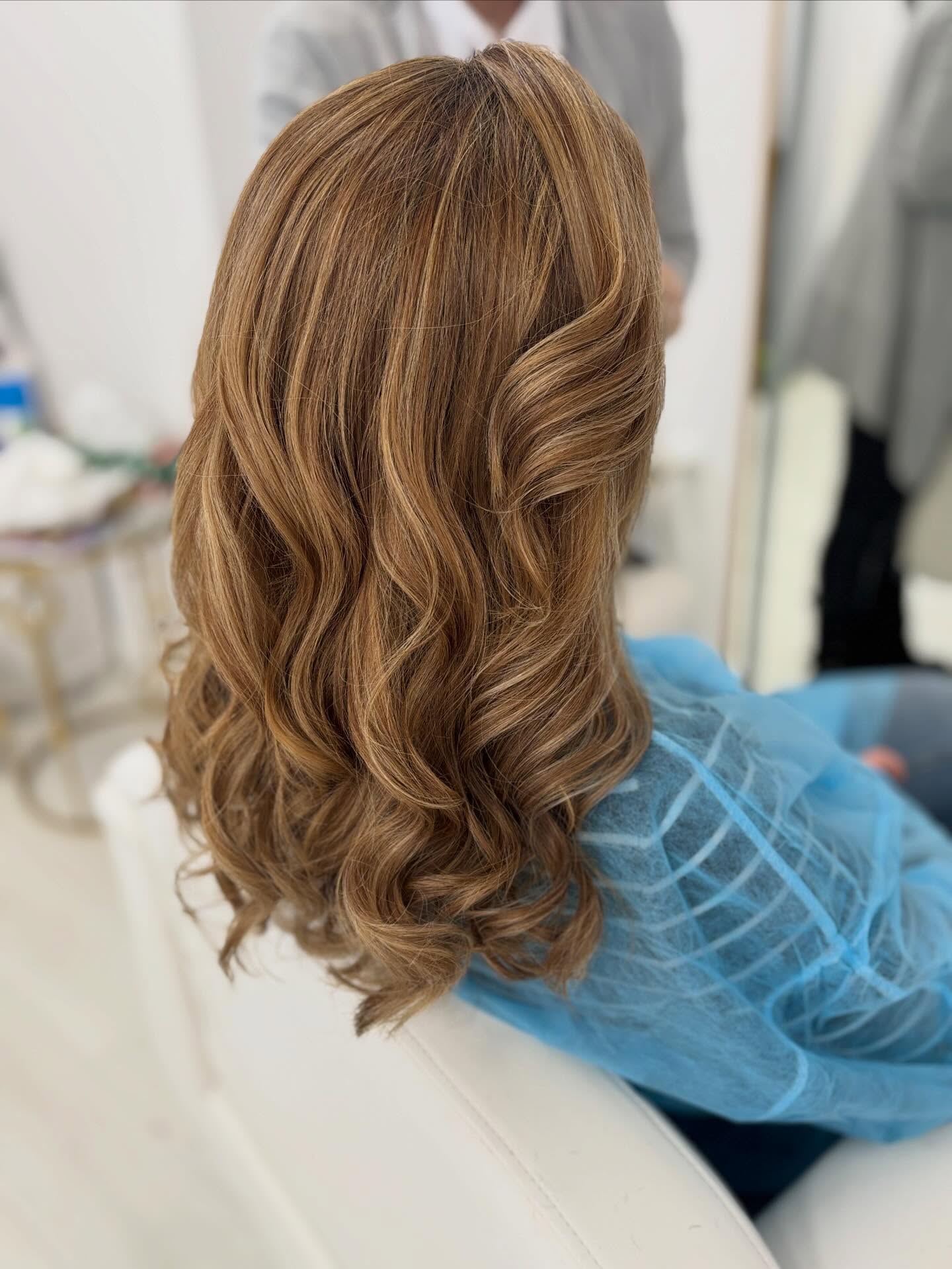 Stylish Medium-Length Cut with Soft, Defined Curls