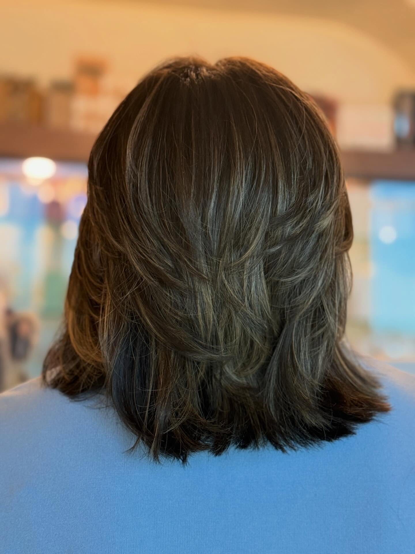 Textured Mid-Length Cut with Subtle Highlights