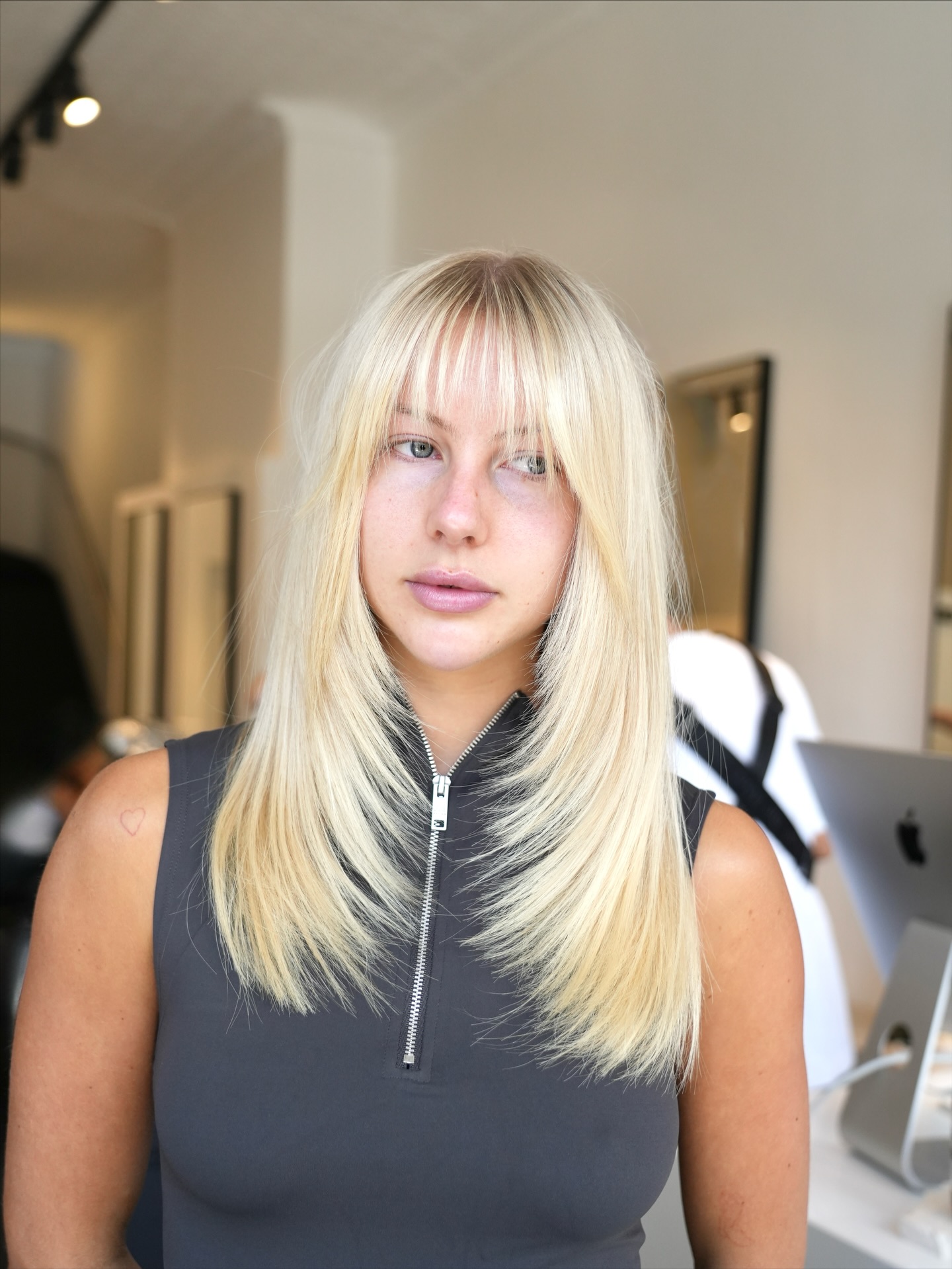 Trendy Wispy Bangs with Long, Sleek Layers