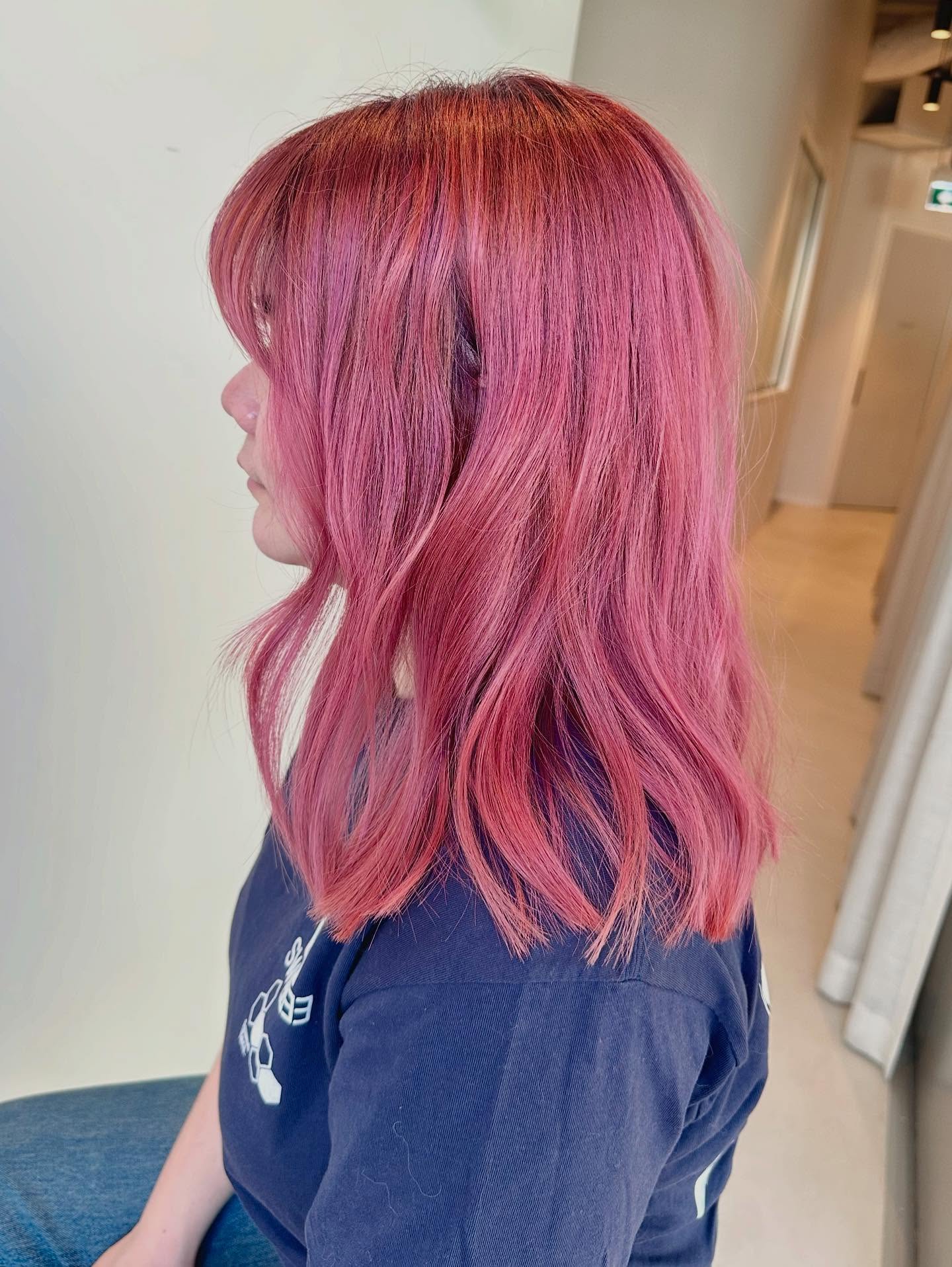 Vibrant Mid-Length Cut with Soft Waves
