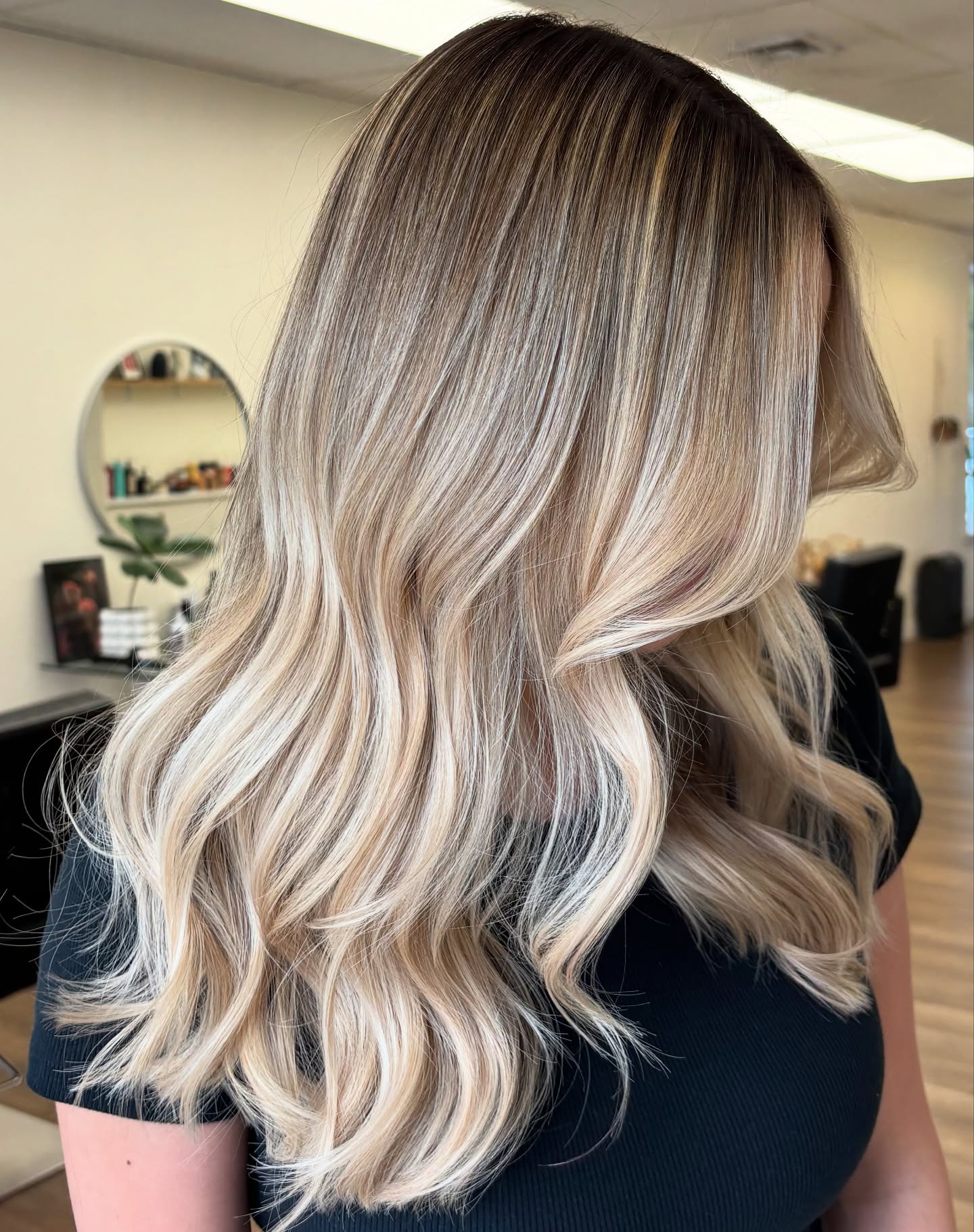 Textured Multi-Dimensional Blonde with Soft Cascading Waves
