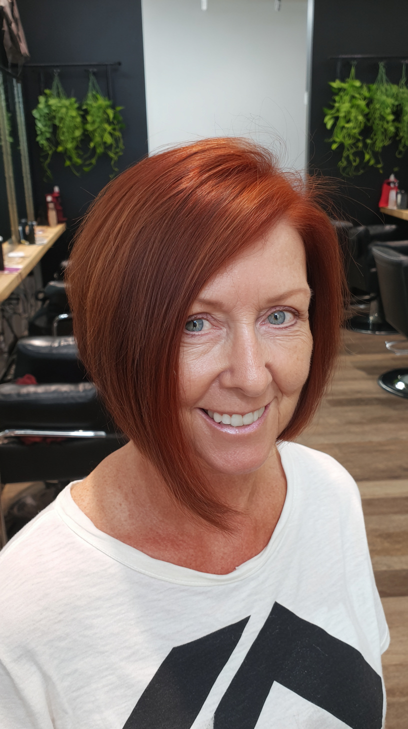 Vibrant Slanted Bob with Rich Copper Tones
