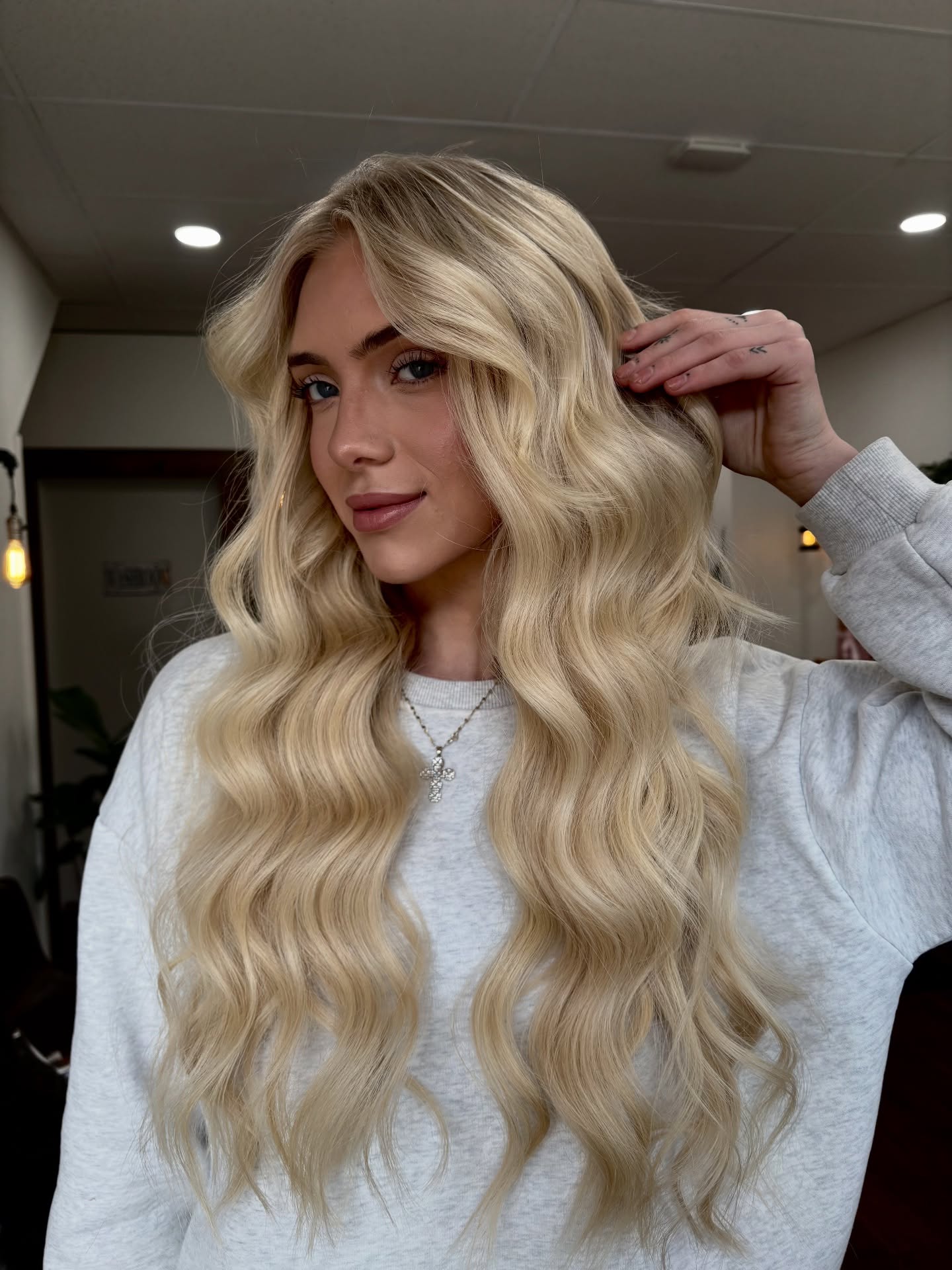 Glamorous Long Vanilla Blonde Waves with Defined Curls