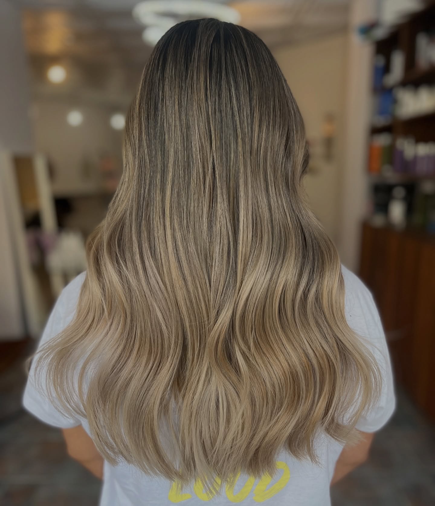 Gorgeous Long Warm Tone Blonde Balayage with Soft Waves