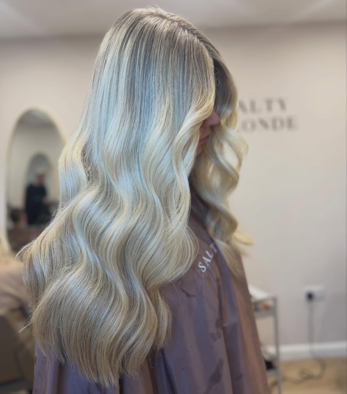 Radiant Creamy Vanilla Blonde with Soft Waves