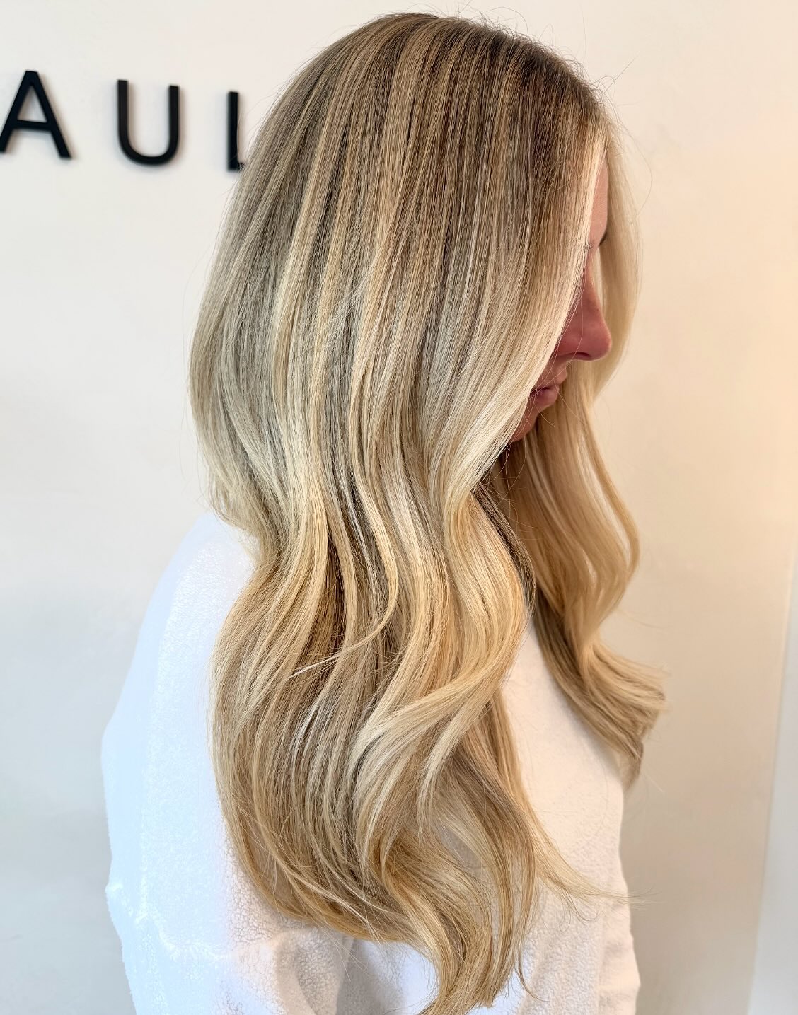 Softly Layered Vanilla Blonde Waves with Natural Movement