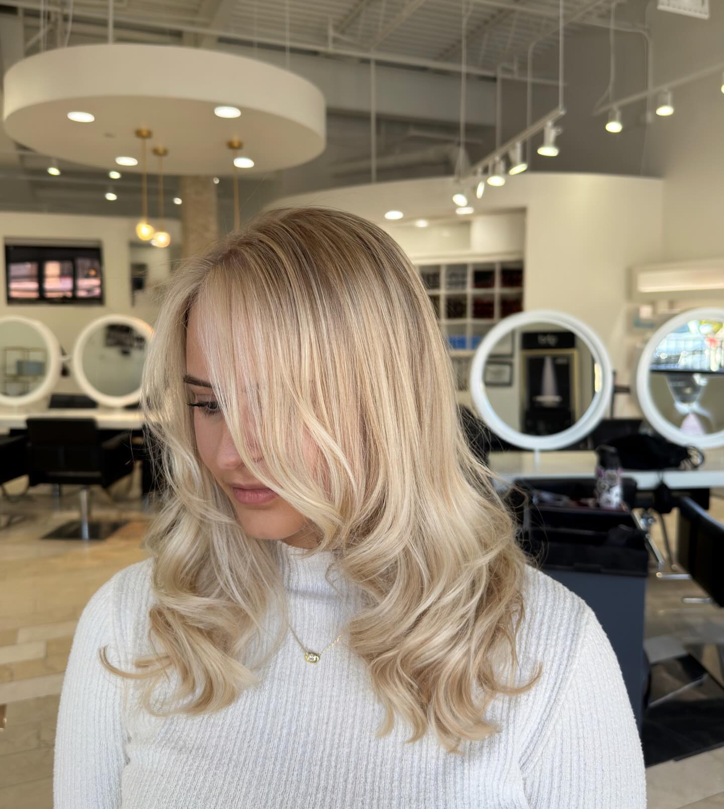 Softly Layered Vanilla Blonde with Beachy Waves