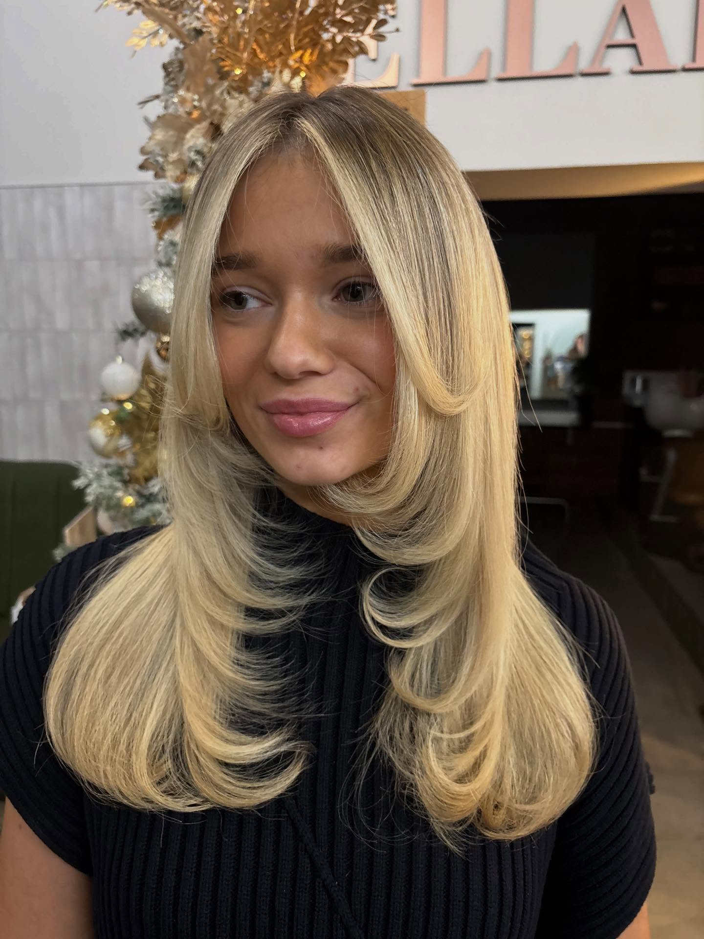 Softly Layered Vanilla Blonde with Elegant Face Framing