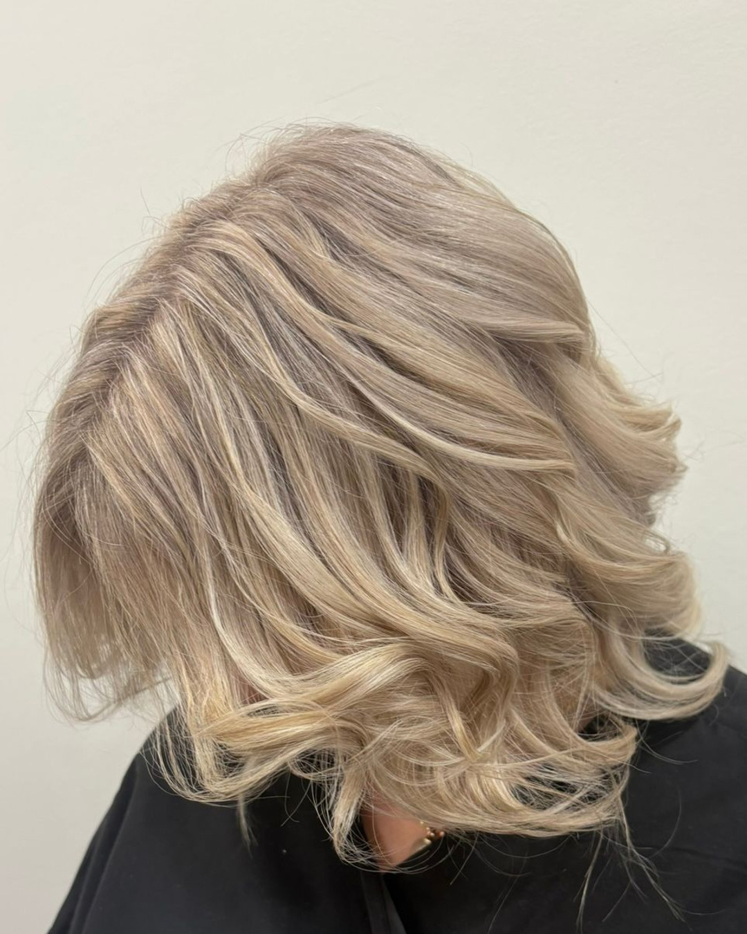 Softly Textured Lived-In Blonde Bob with Gentle Waves