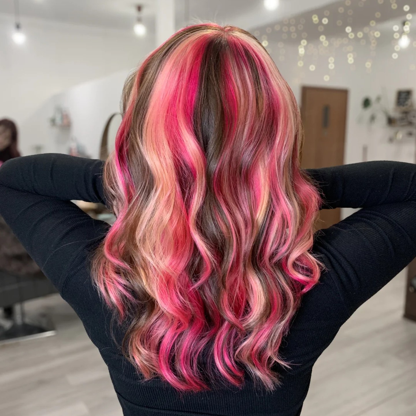 Bold Pink and Chocolate Long Waves with Face-Framing Highlights
