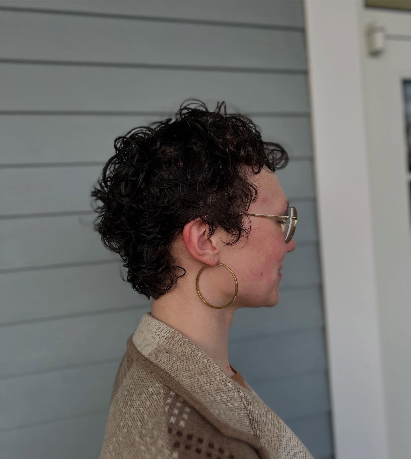 Textured Curly Pixie Cut with Emphasized Layers