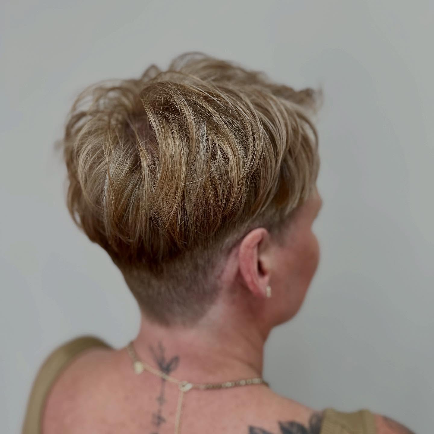 Textured Pixie Cut with Bold Undercut