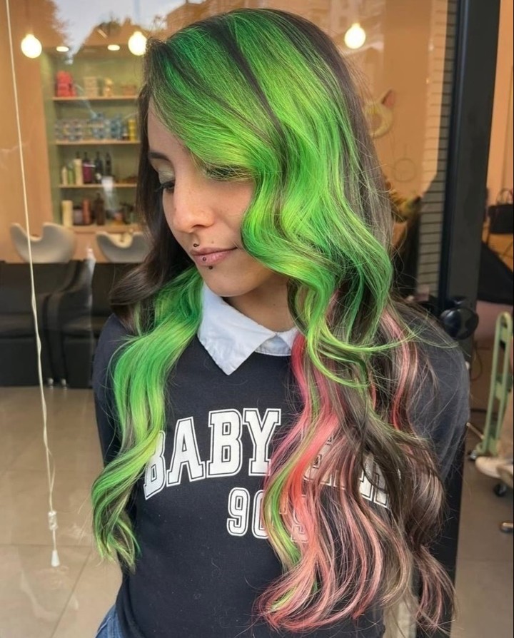 Vivid Green and Pink Ombre Waves with Face-Framing Layers