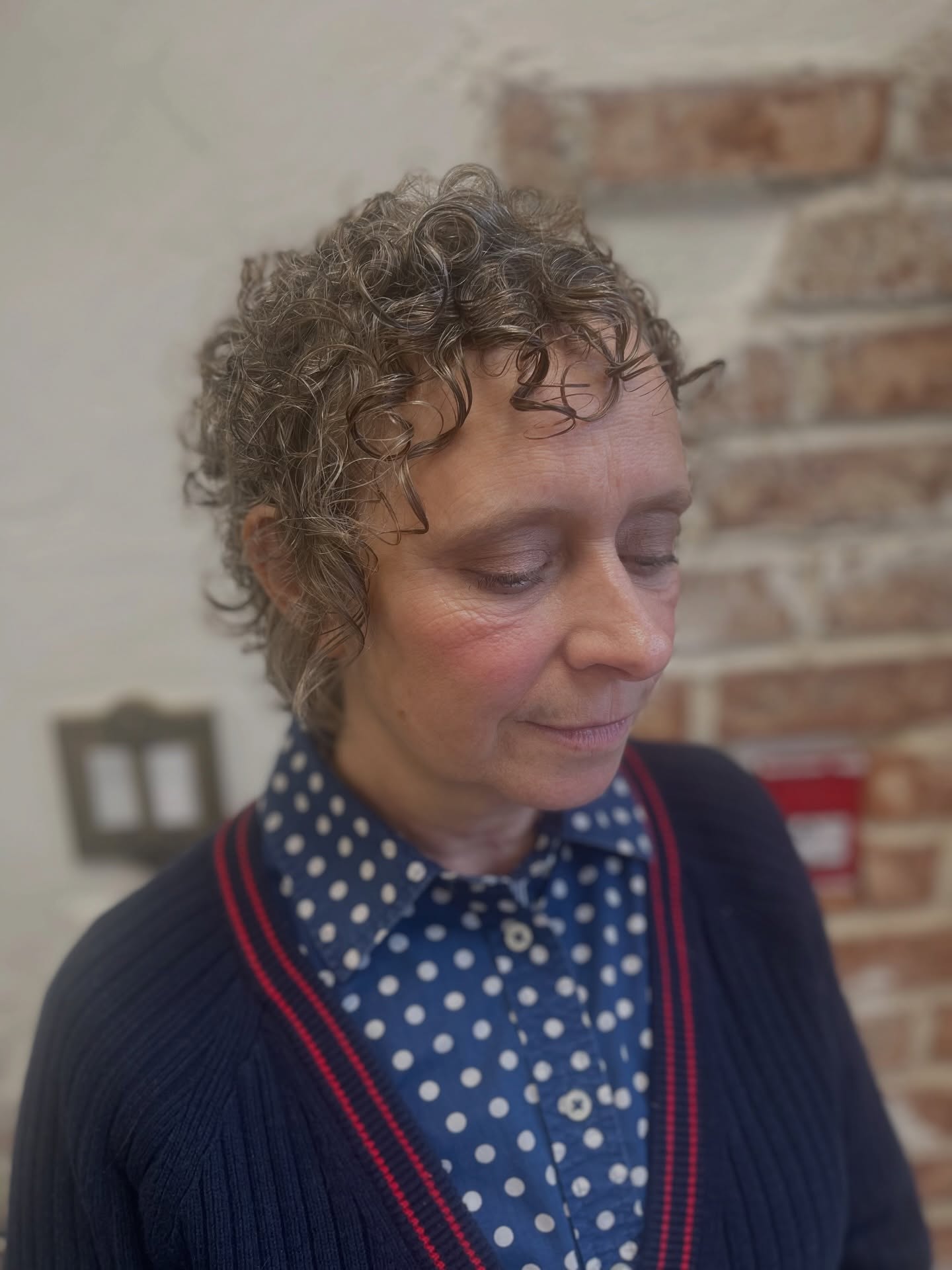 Chic Curly Pixie Cut with Soft Layers
