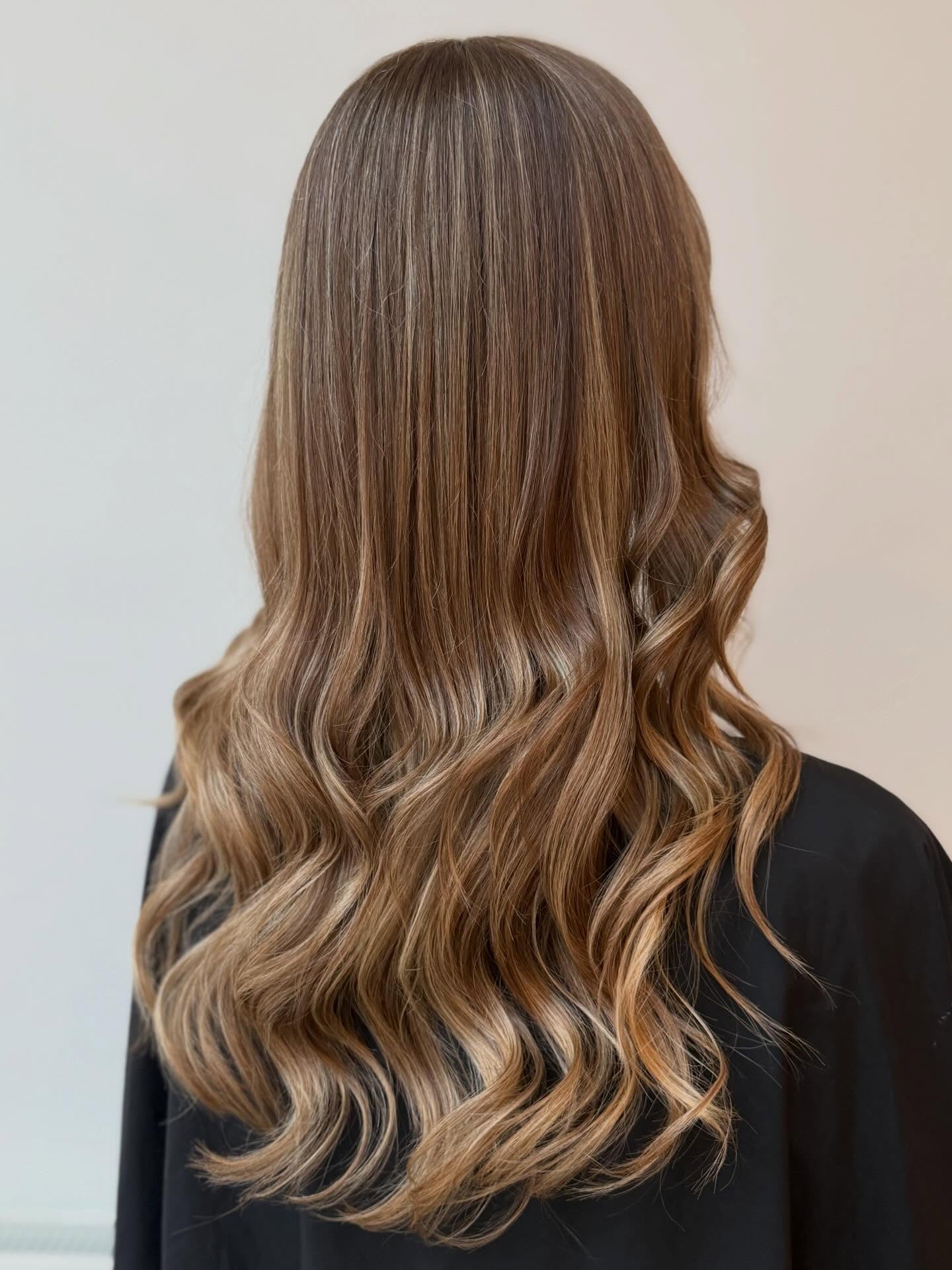 Softly Textured Long Waves with Subtle Caramel Highlights