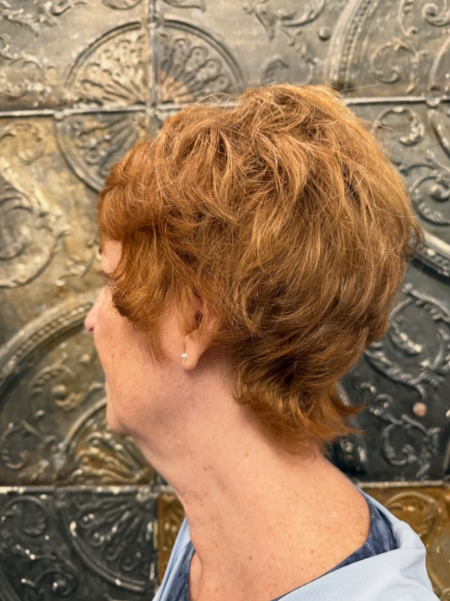 Textured Auburn Pixie Cut with Natural Volume