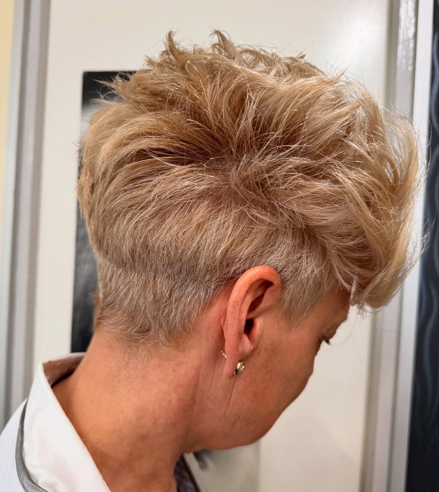 Textured Blonde Pixie Cut with Volume