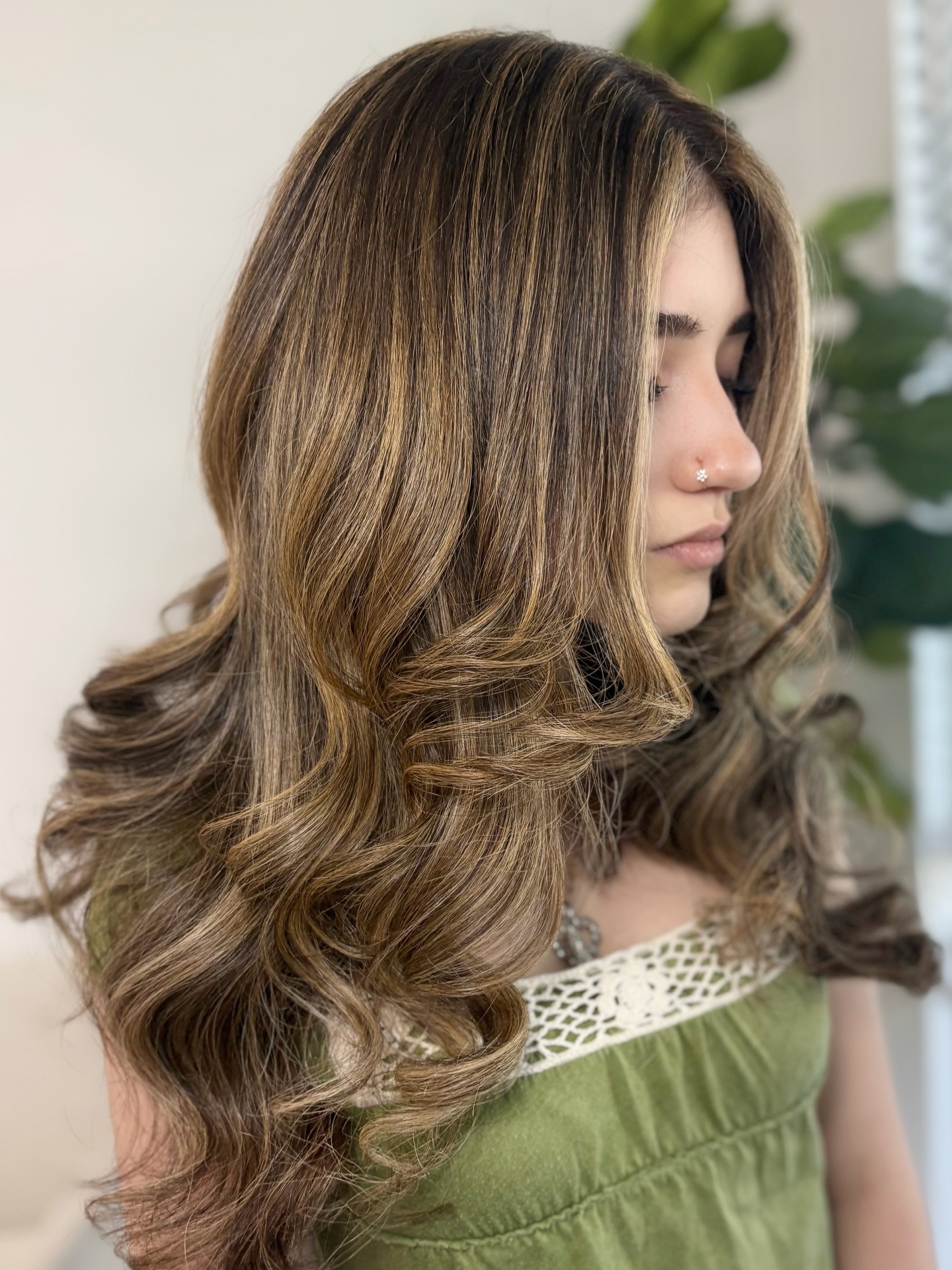 Warm Honey Blonde Curls with Subtle Dimension
