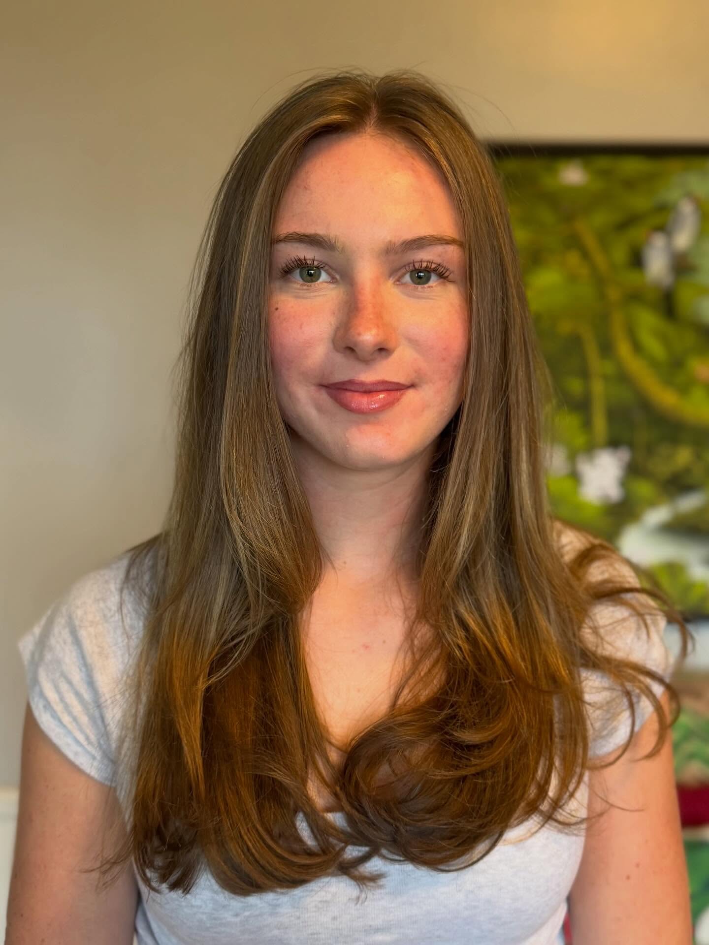 Sleek Long Cut with Subtle Layers and Natural Shine