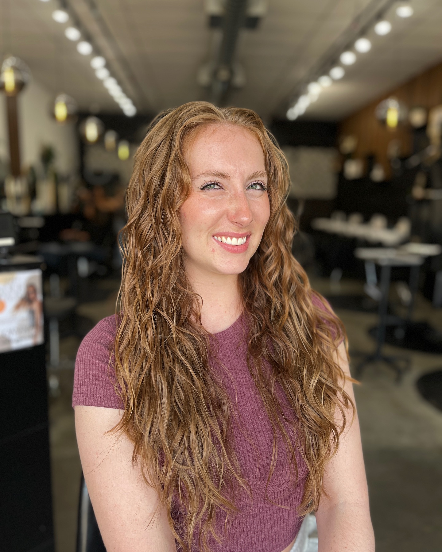 Textured Long Curly Cut with Subtle Highlights
