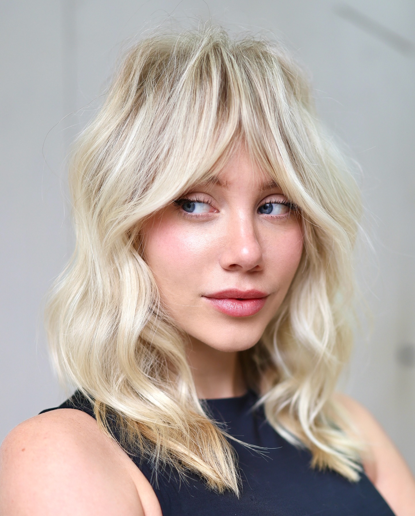 Textured Mid-Length Shag with Playful Bangs
