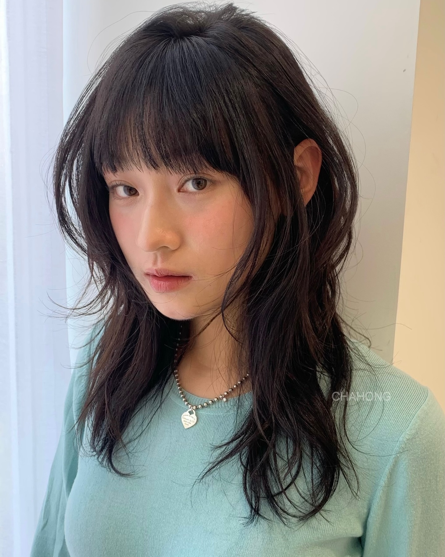 Textured Mid-Length Shag with Soft Bangs