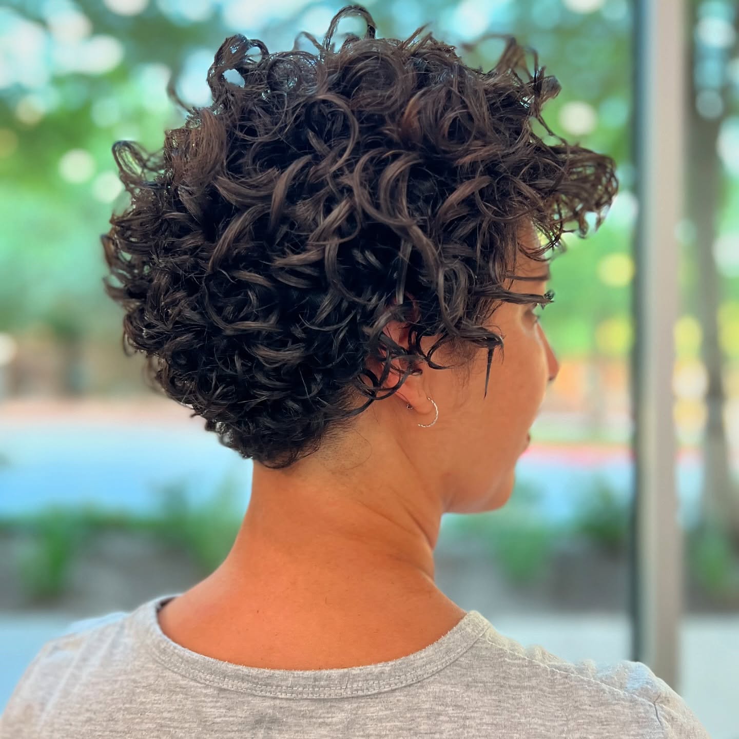Modern Curly Pixie with Defined Curls