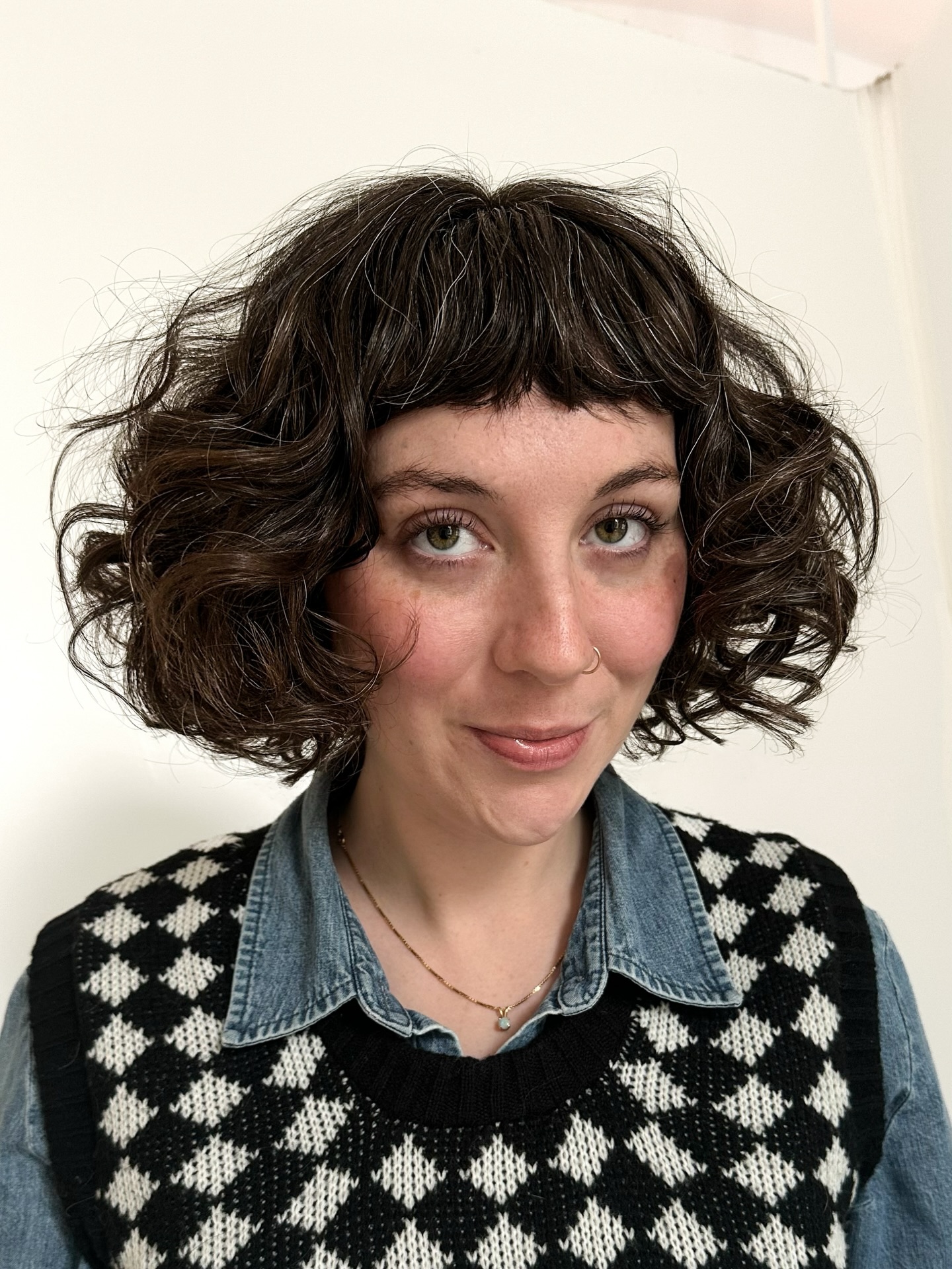 Playful Curly Bob with Micro Fringe