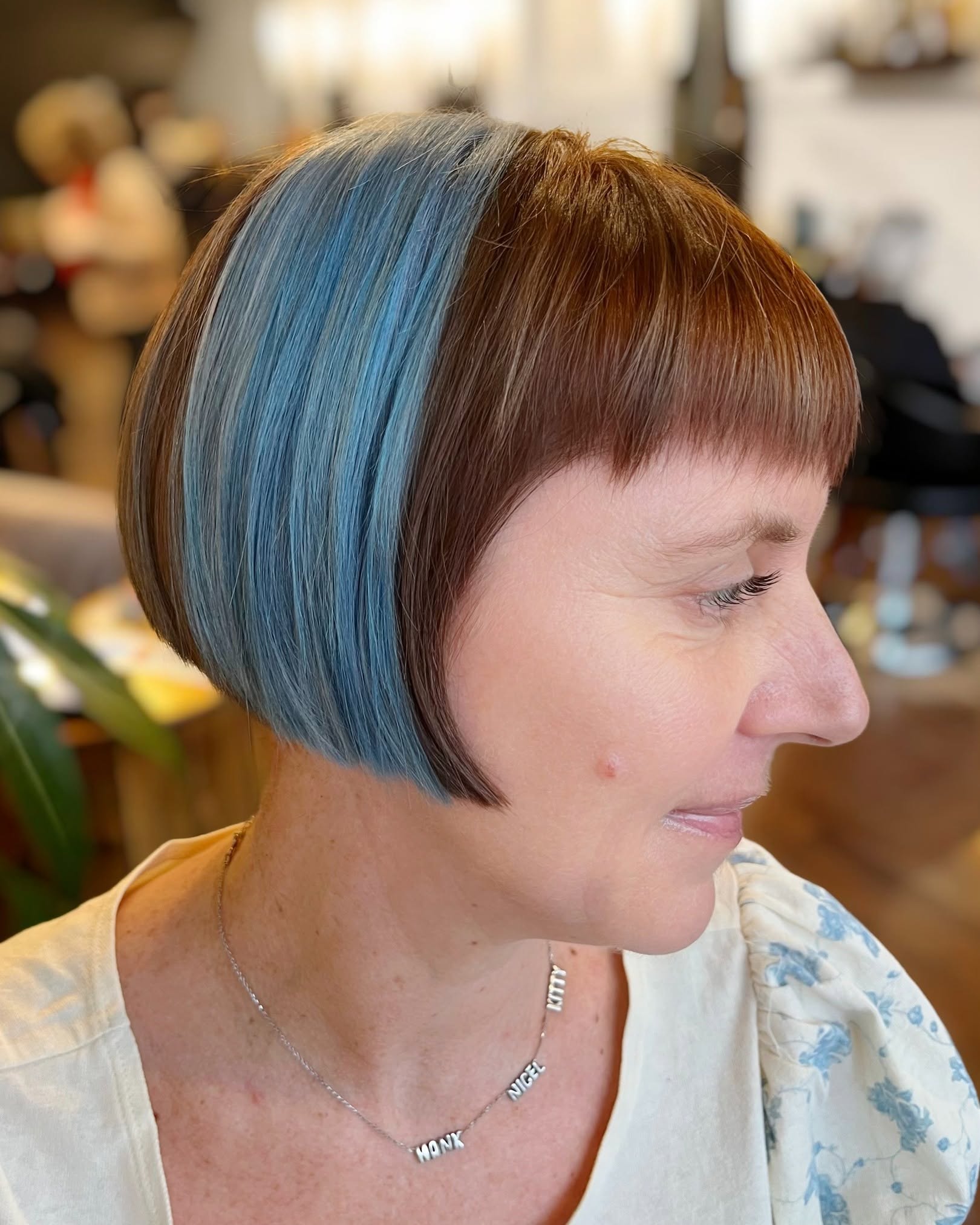 Bold Asymmetrical Bob with Blue Highlights