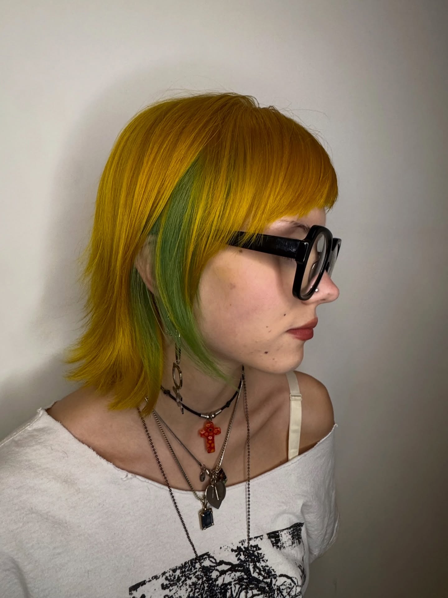 Bold Two-Toned Cut with Vibrant Yellow and Green