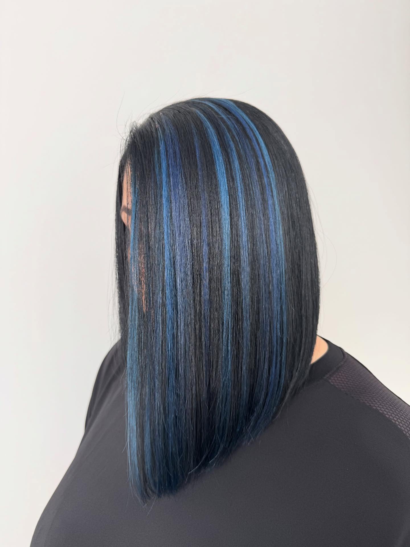 Chic Stacked Lob with Bold Blue Highlights