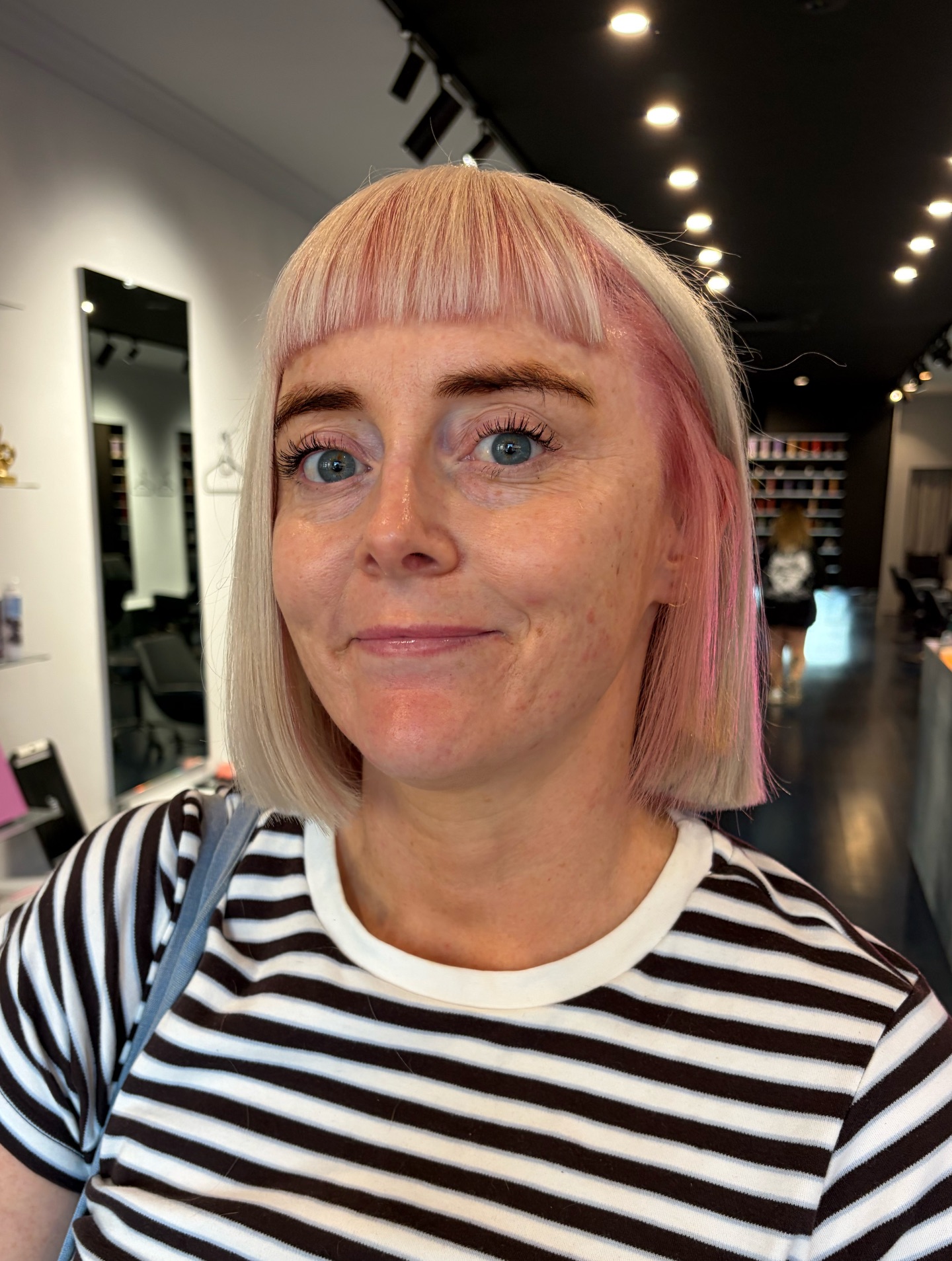 Edgy Blunt Lob with Soft Pastel Pink Highlights