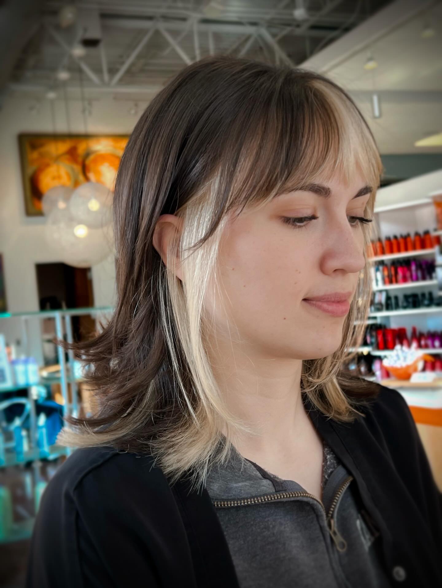 Edgy Layered Cut with Bold Blonde Face-Framing Highlights