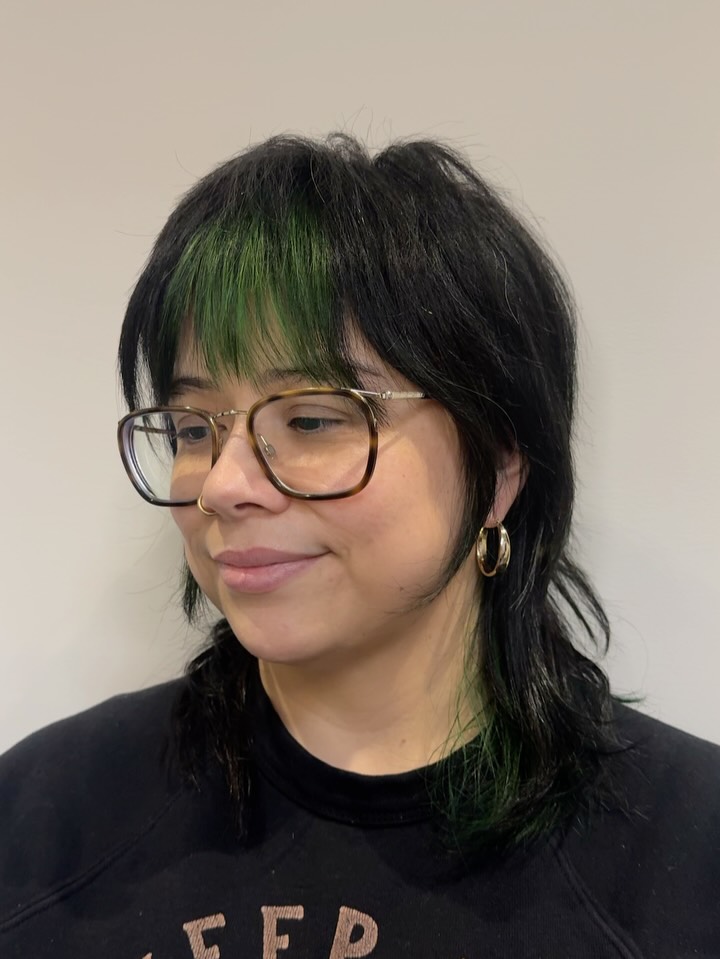 Edgy Textured Mullet with Vibrant Green Accents