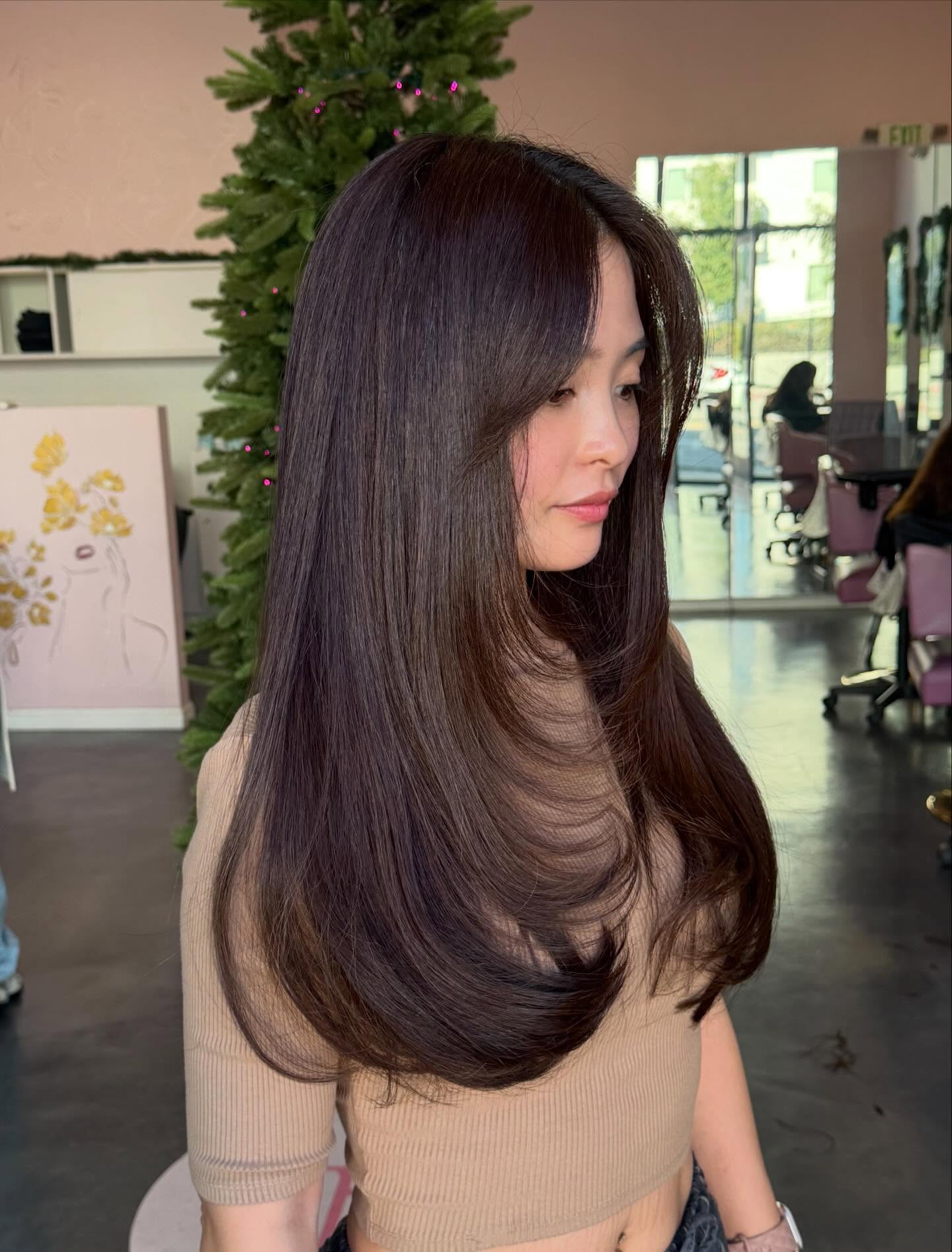 Glossy Long Butterfly Haircut with Soft Bangs