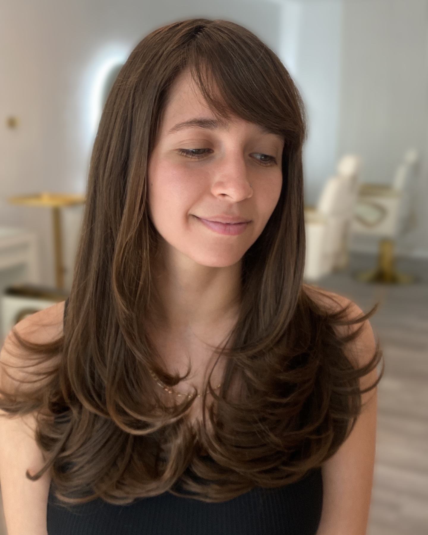 Layered Butterfly Haircut with Soft Bangs