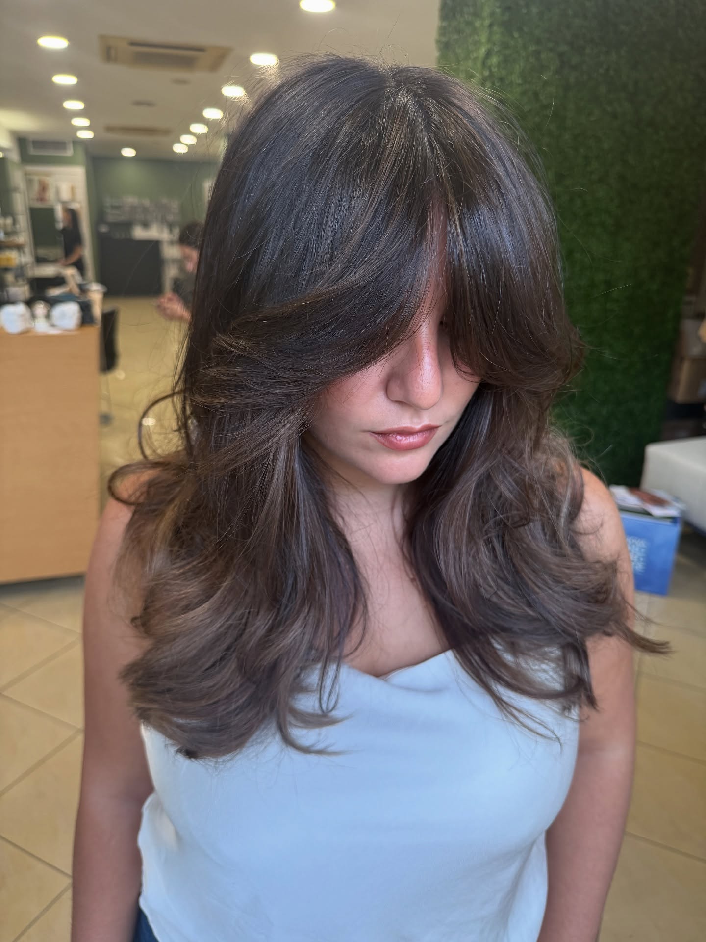 Modern Butterfly Cut with Long, Soft Bangs