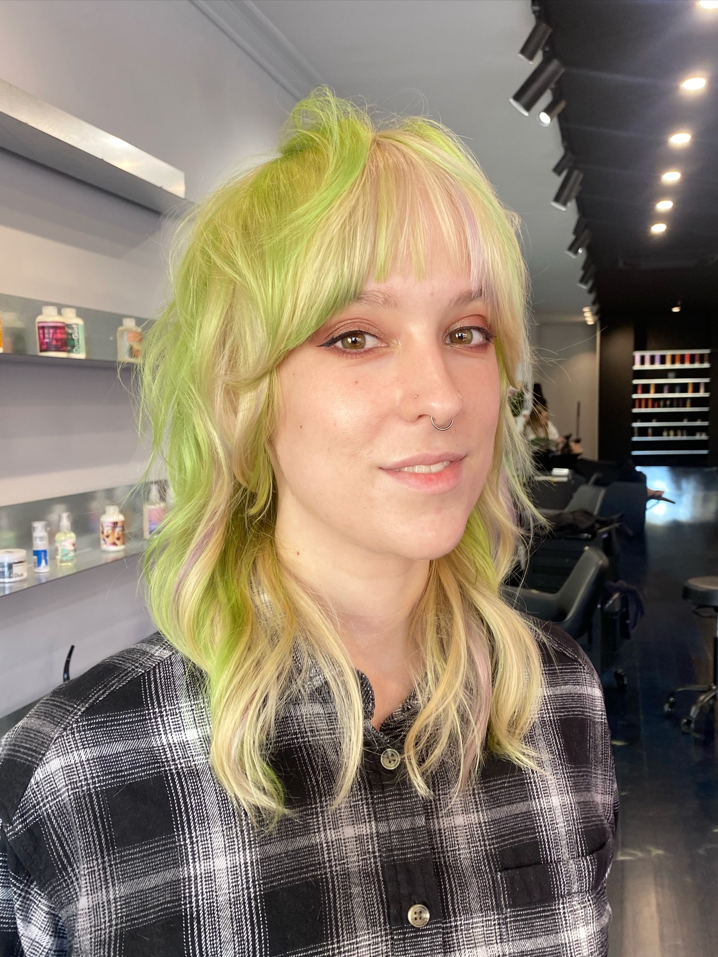 Playful Textured Cut with Pastel Green and Blonde Highlights