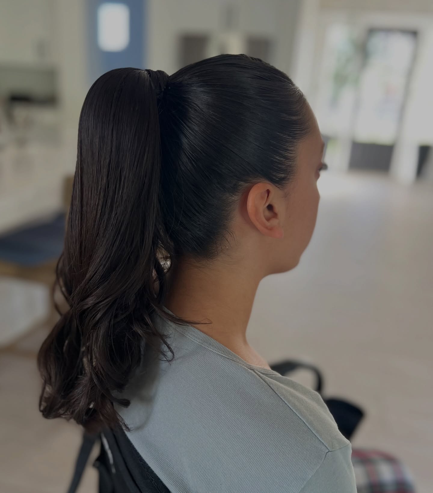 Polished High Ponytail with Soft Waves