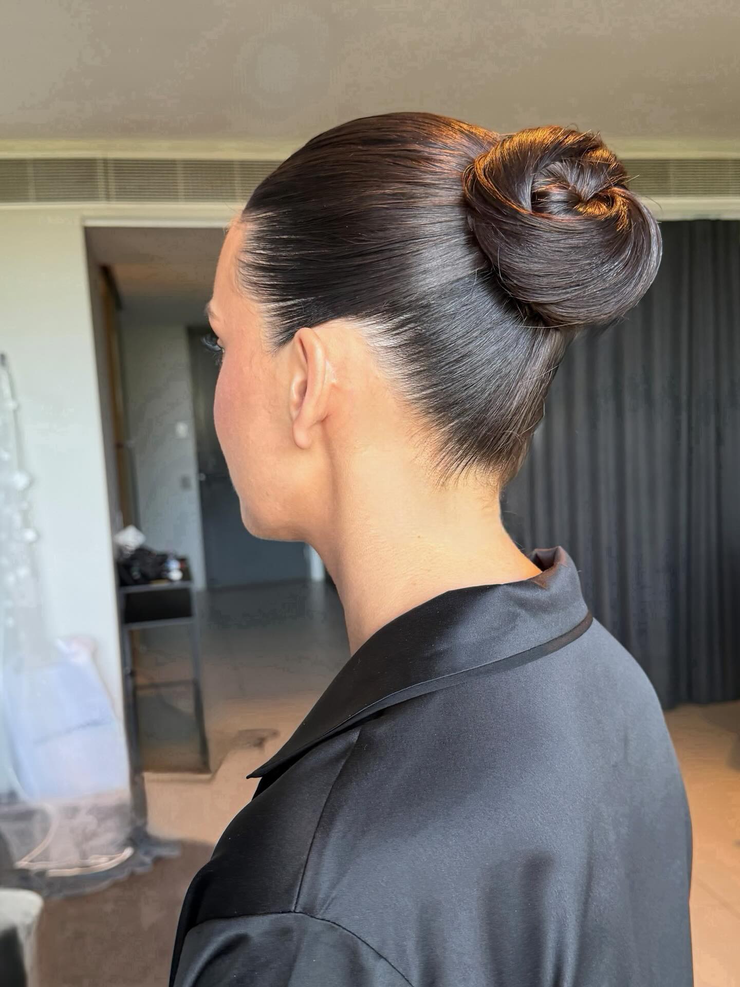Polished Low Bun with Elegant Twisted Detail