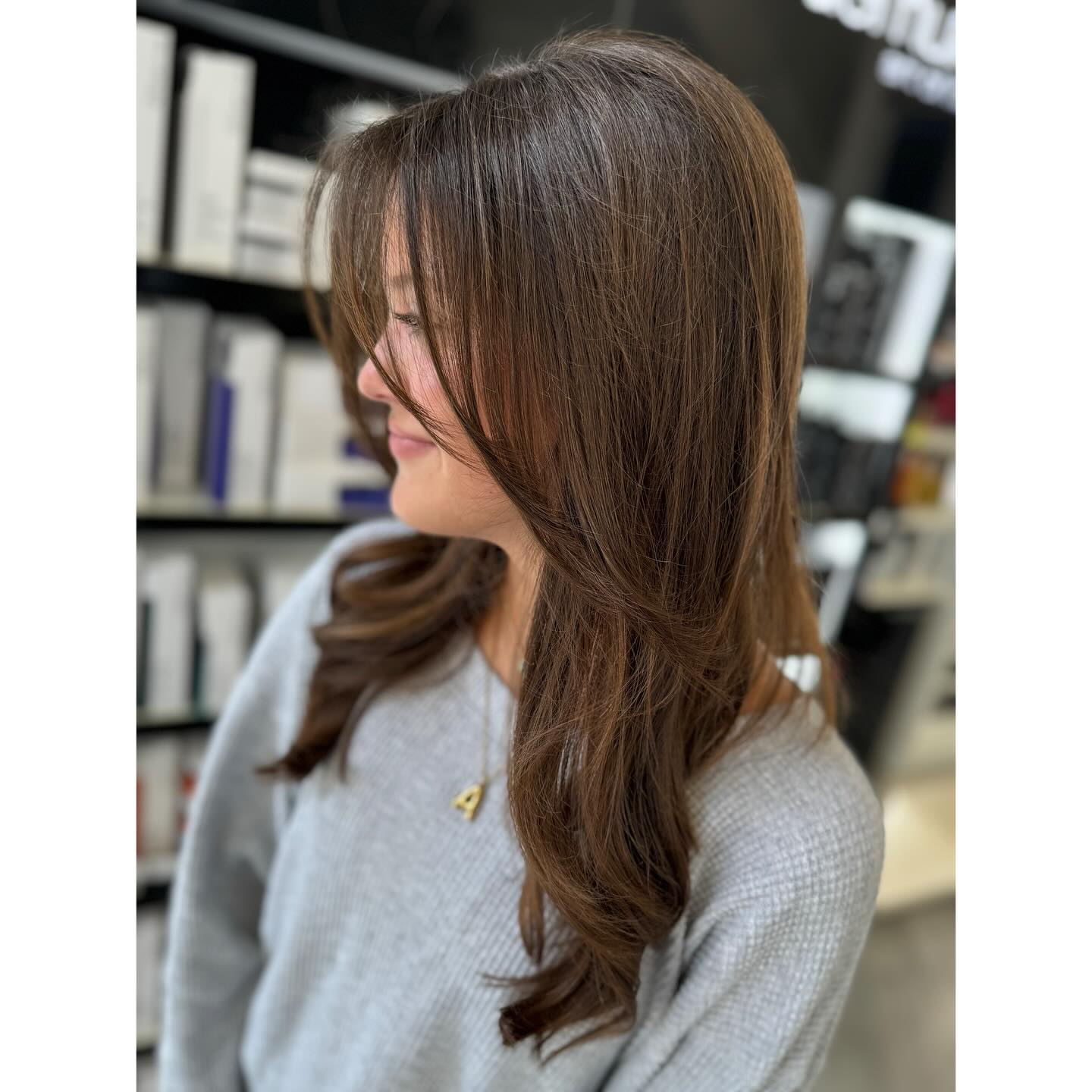 Soft Layered Butterfly Haircut with Face-Framing Bangs