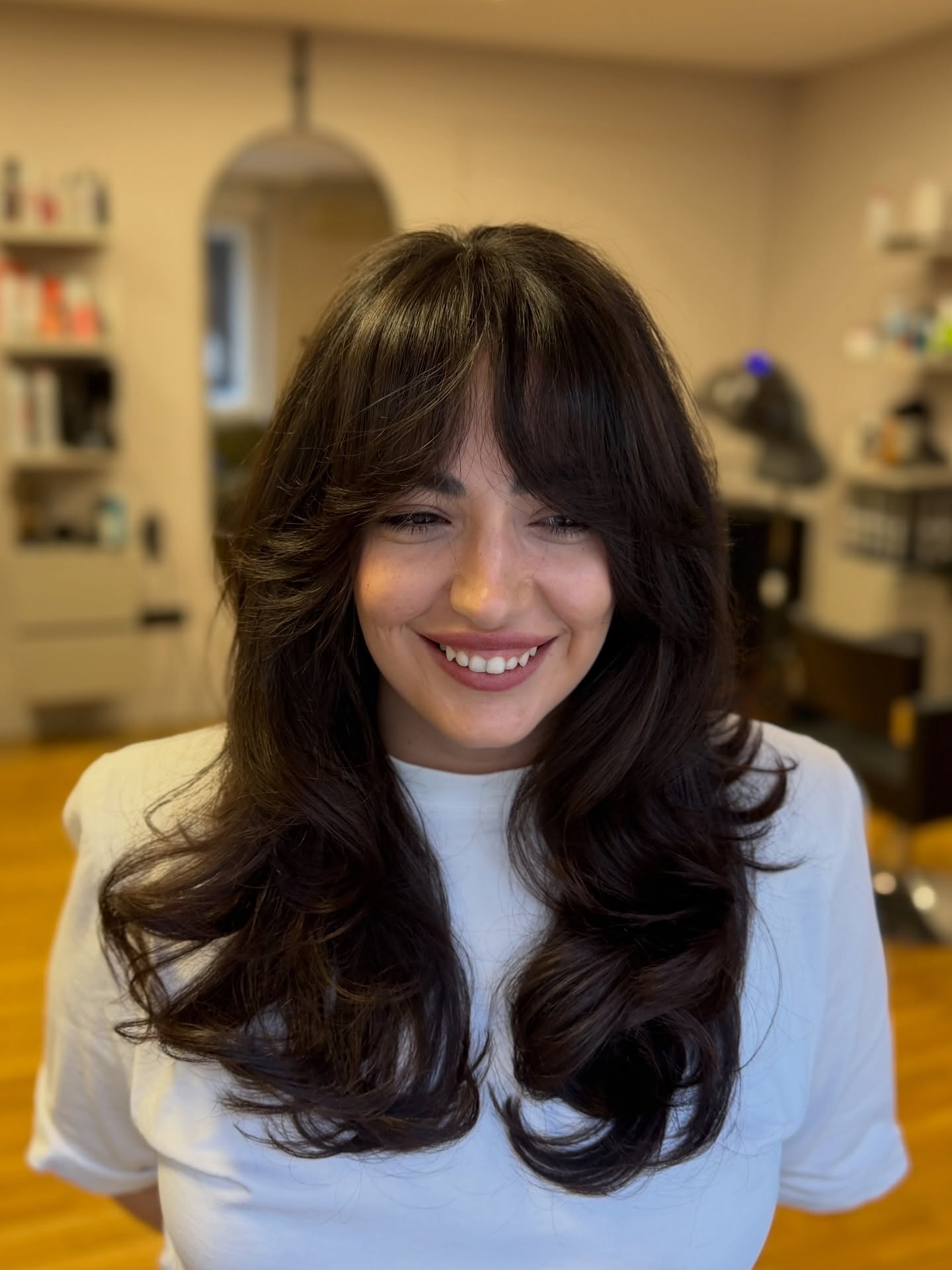 Stylish Layered Butterfly Cut with Fluffy Bangs