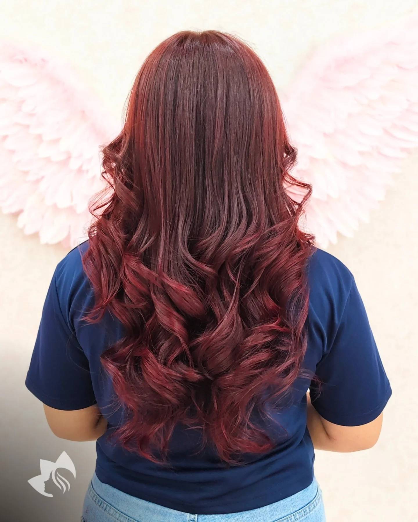 Vibrant Long Curls with Deep Cherry Highlights