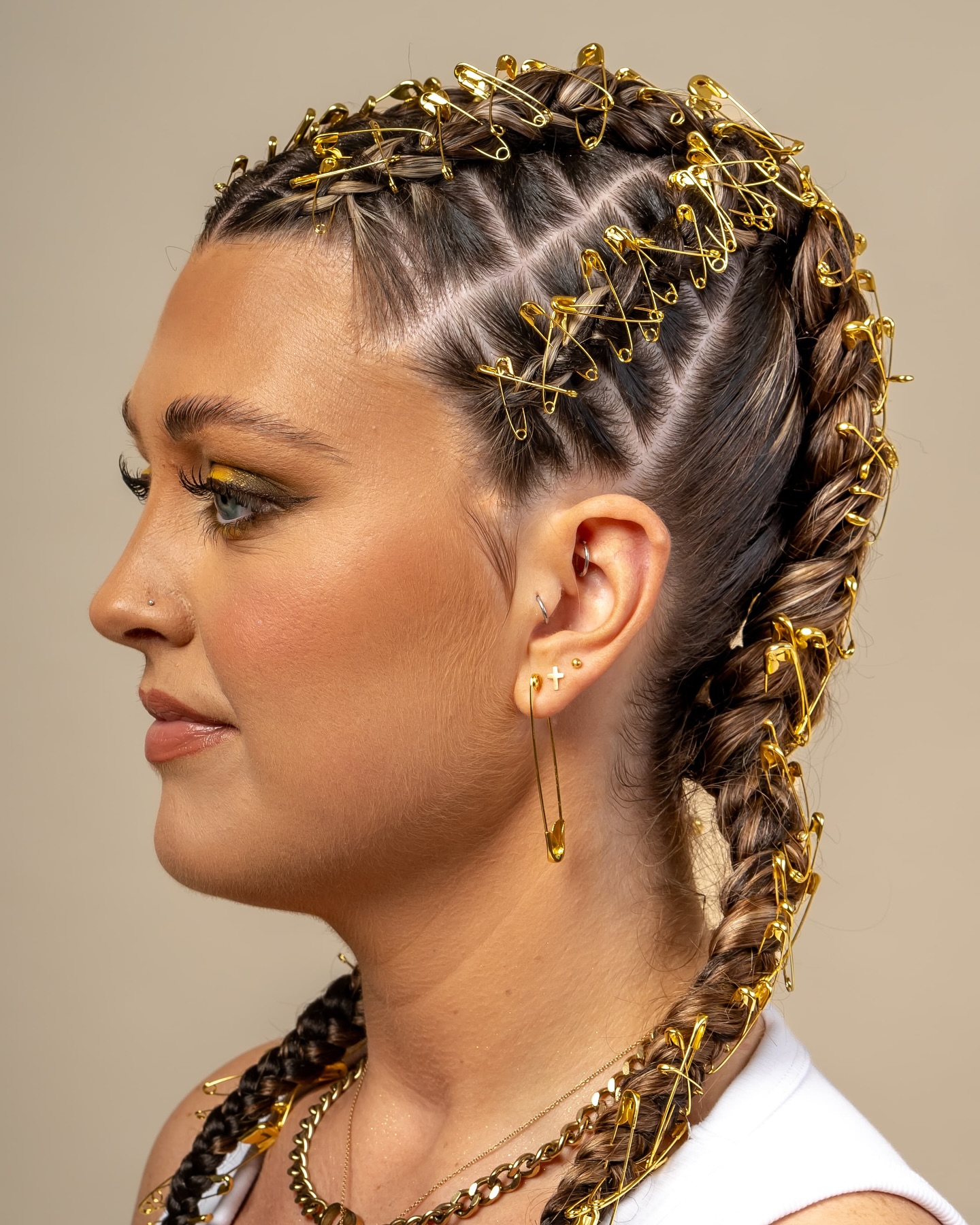 Bold Braided Updo with Decorative Safety Pins